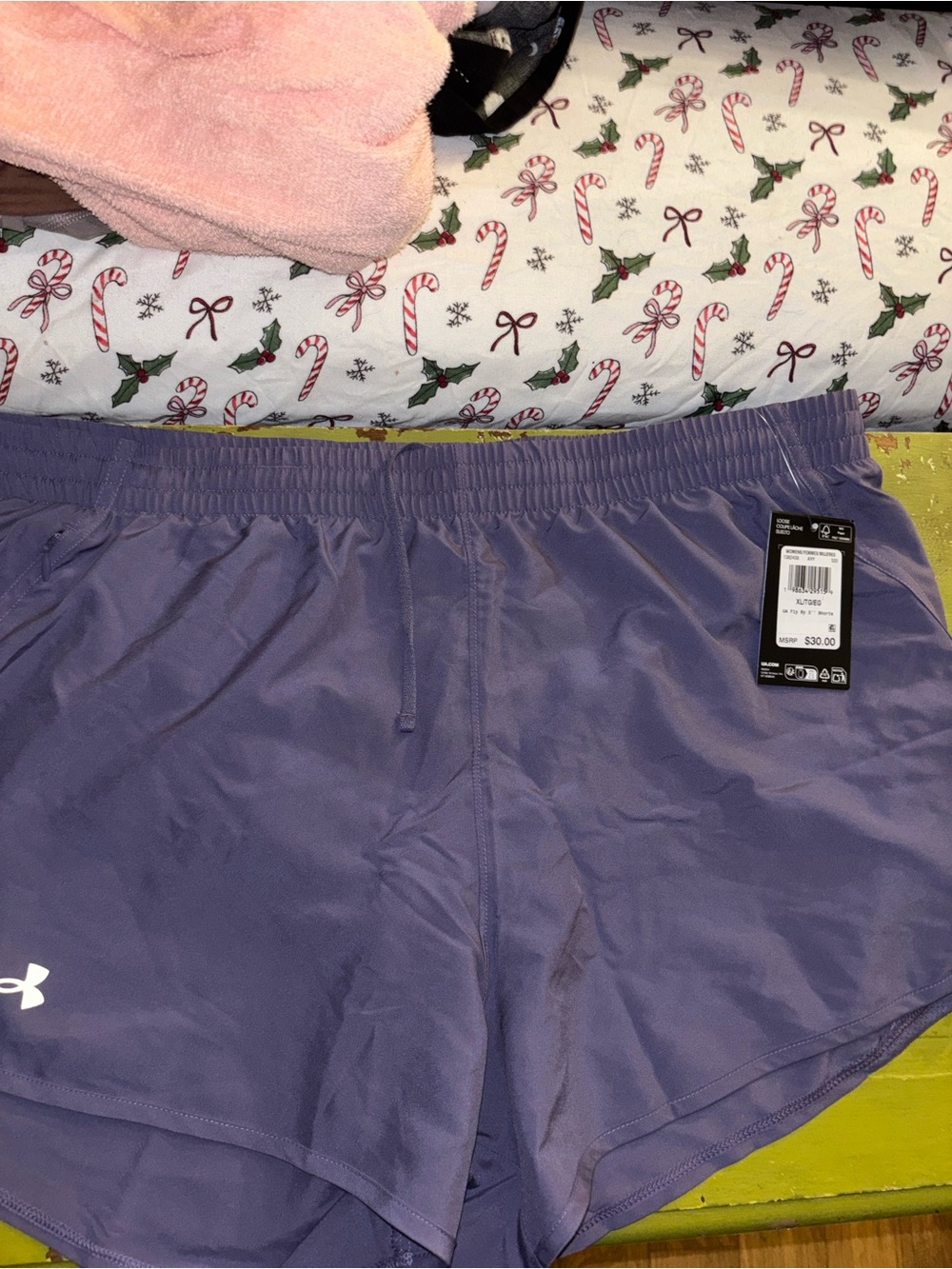 Women’s purple shorts with white logo